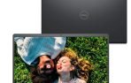 Notebook Dell Inspiron I15 preto aberto com tela de 15.6 polegadas, exibindo imagem vibrante.